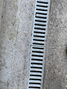 French drain system protecting basement from water intrusion and damage.